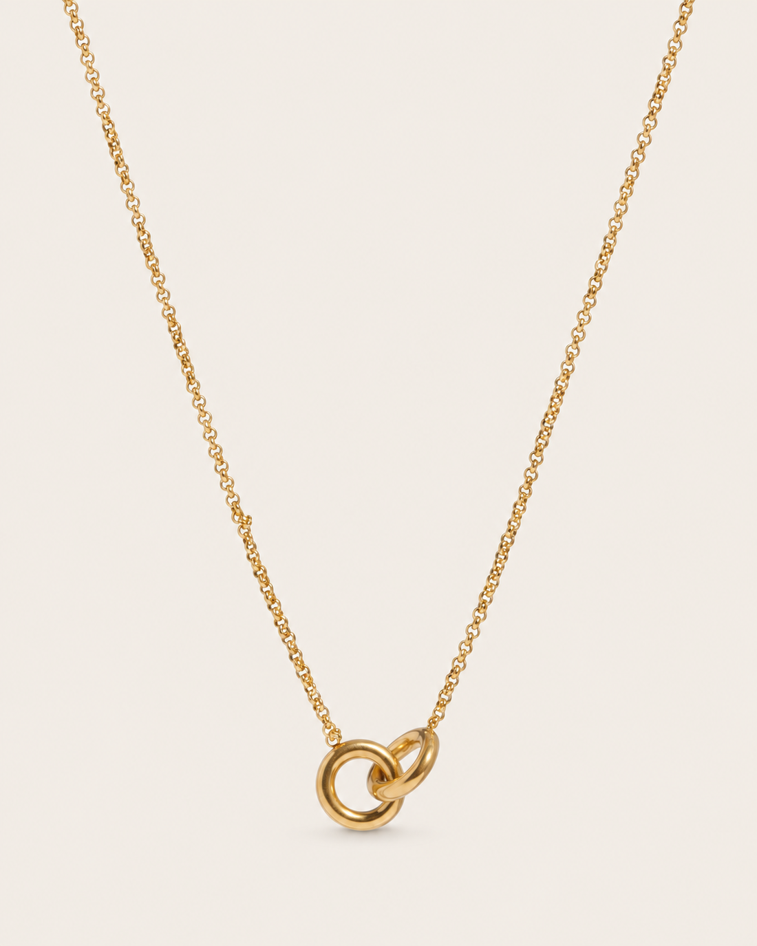 Gold-tone interlocking circles necklace with two linked rings