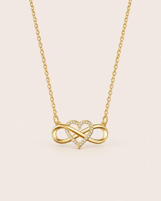 Gold infinity heart necklace with sparkling stones