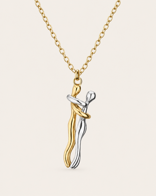 Gold and silver hugging couple necklace with embrace pendant