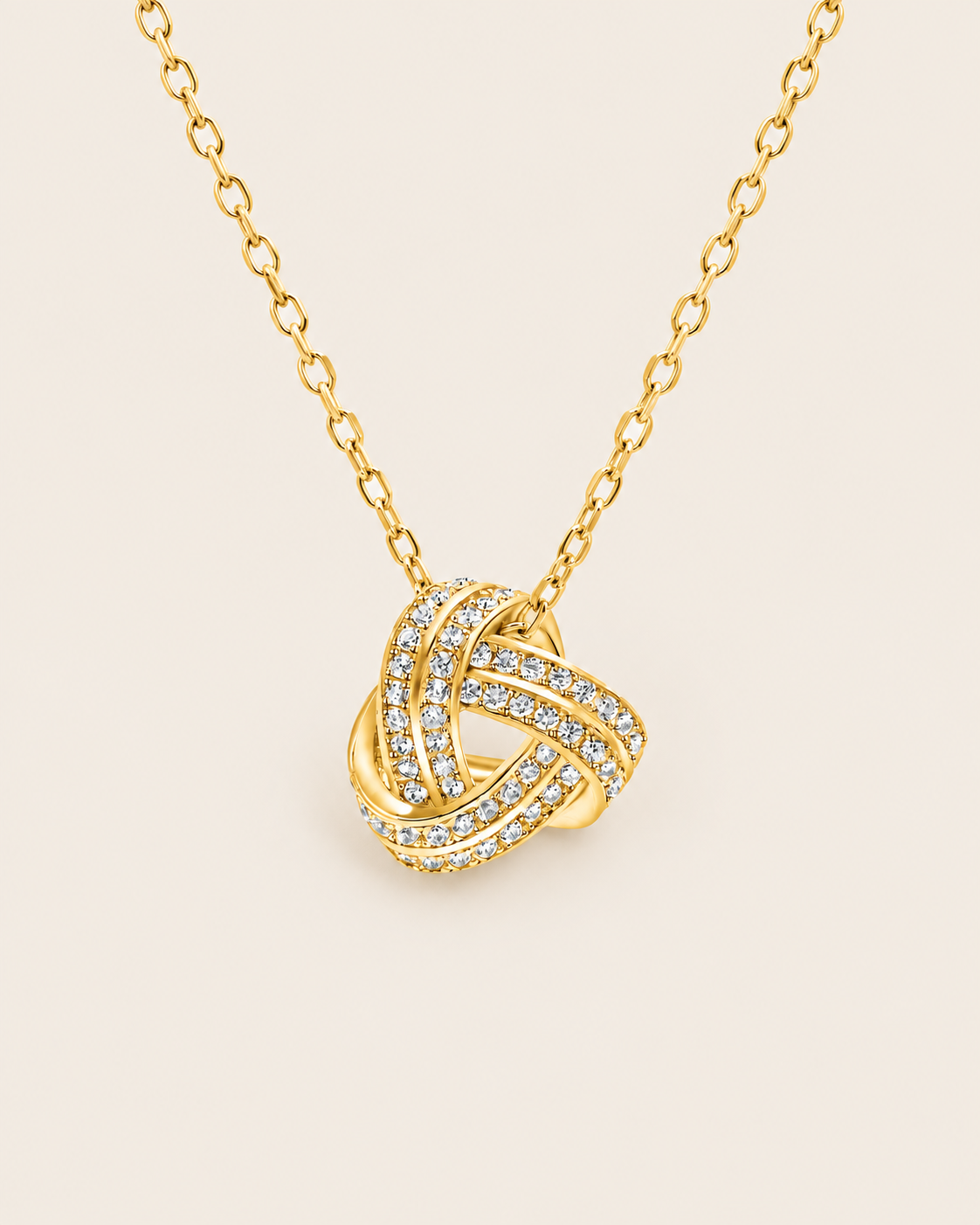 Gold love knot necklace with sparkling stones